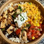 Southwest Chicken Burrito Bowl with rice, beans, corn, and avocado